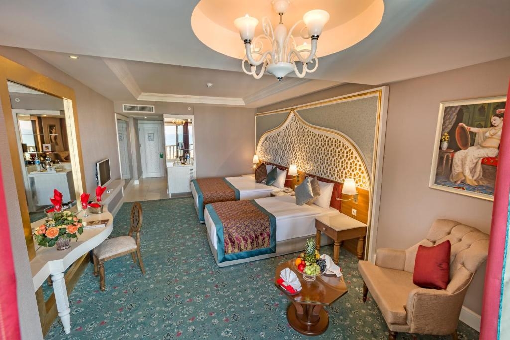 Room image 1 - Dvojlôžková izba superior s dvoma prístelkami, bočný výhľad na more