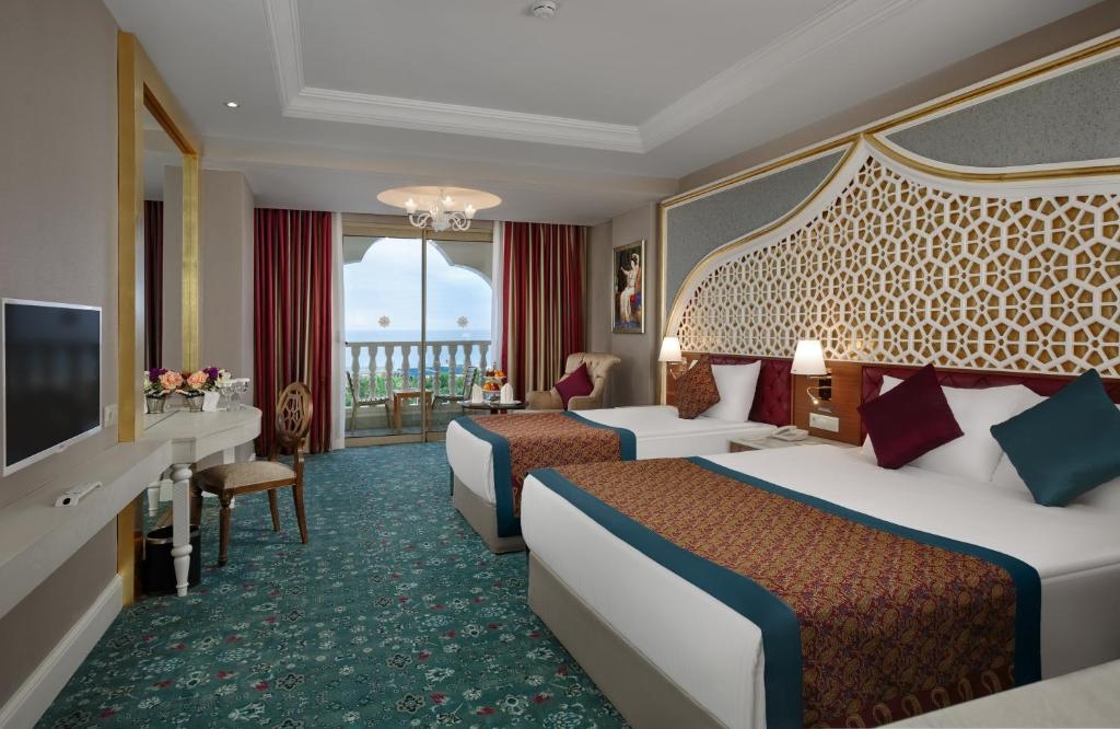 Room image 3 - Dvojlôžková izba superior s dvoma prístelkami, bočný výhľad na more